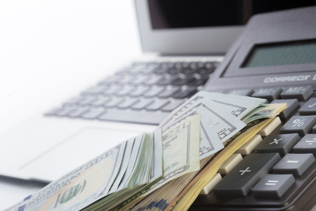 money on laptopの写真素材