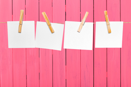 Blank paper notes with copy space pinned on ropeの写真素材