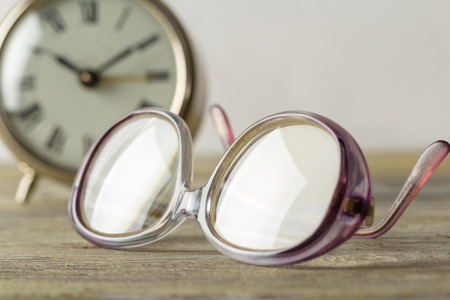 glasses and alarm clockの写真素材