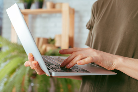 Woman Using Laptop, Indoors