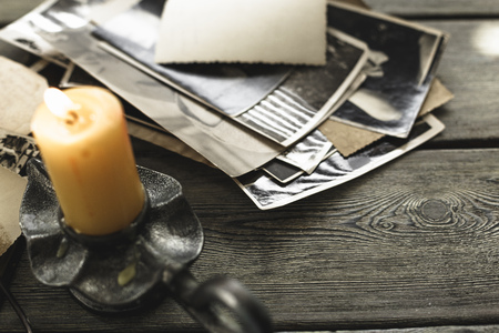 retro some old photos on wooden tableの写真素材