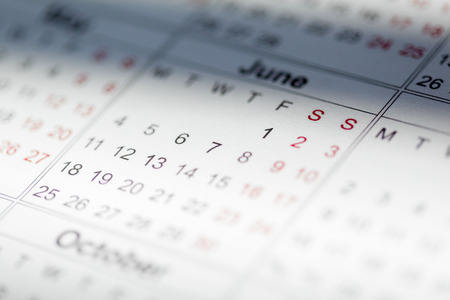 Closeup of dates on calendar pageの写真素材