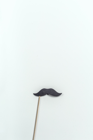 mustache photo prop on a tableの写真素材