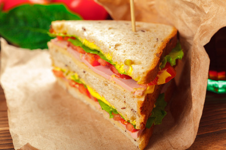 sandwich on a wooden tableの写真素材