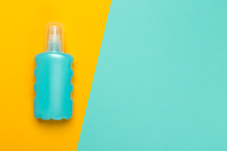 Cosmetic product on a bright bicolor background, top viewの写真素材