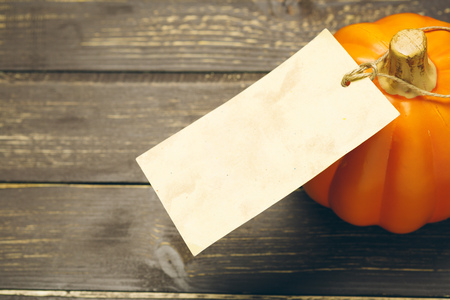 Pumpkin on old rustic wooden table.の写真素材