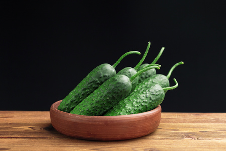 Cucumber on wooden backgroundの写真素材
