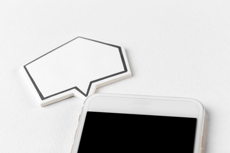 phone with blank speech bubbleの写真素材