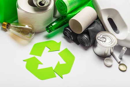 Eco concept with recycling symbol on table background top view