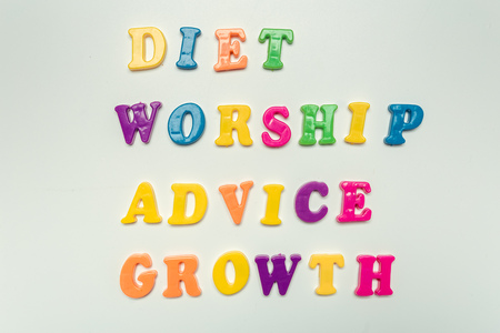 Colorful plastic words letters on a white backgroundの写真素材