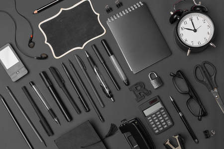 Concept back to school watch chalk line cookies stationery on black background.の写真素材