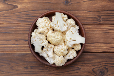 Organic cauliflower on wooden backgroundの写真素材