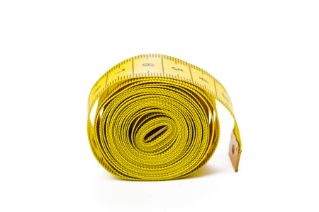 yellow metric measuring tape isolated on white panorama background