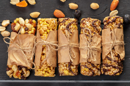 Granola bar on wooden backgroundの写真素材