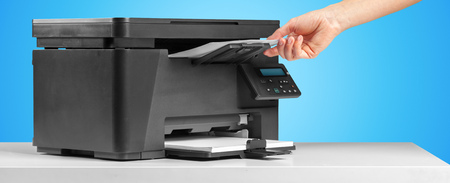 Printer copier machine on a bright colored background
