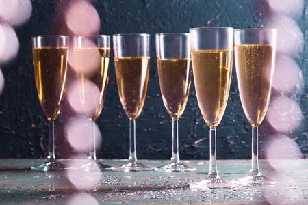 Glasses of champagne on the tableの写真素材