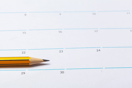 Closeup of dates on calendar pageの写真素材