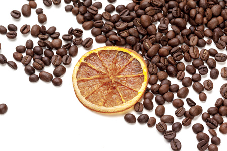 Pile coffee beans isolated on white backgroundの写真素材