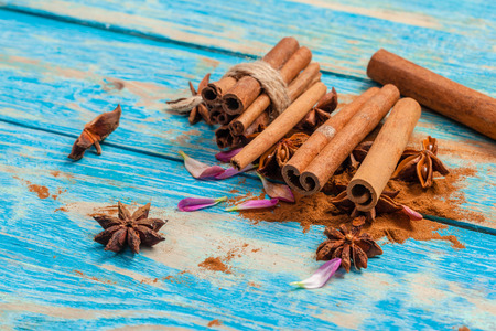 Cinnamon on wooden board.