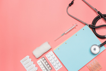 Medical equipment on a pink pastel background.の写真素材