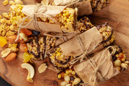 Granola bar on wooden backgroundの写真素材