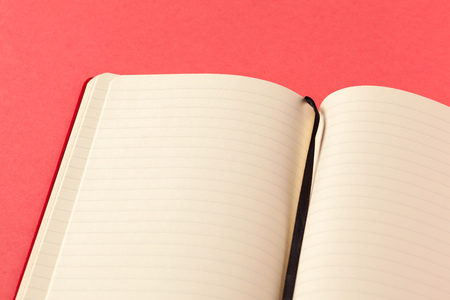 Blank paper pieces  on a colored pink backgroundの写真素材