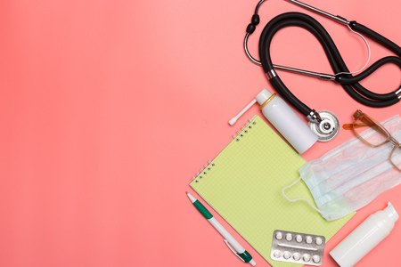 Medical equipment on a pink pastel background.の写真素材