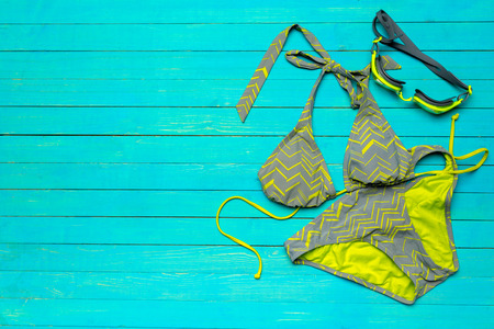 swimsuit on wooden tableの写真素材