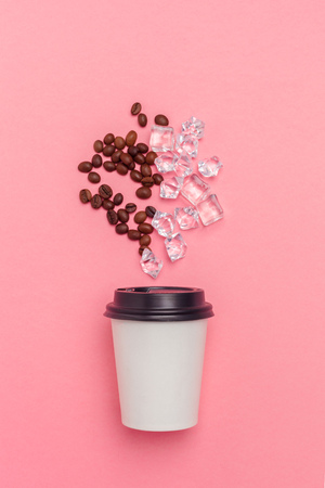 take away coffee cup on colorful paper backgroundの写真素材