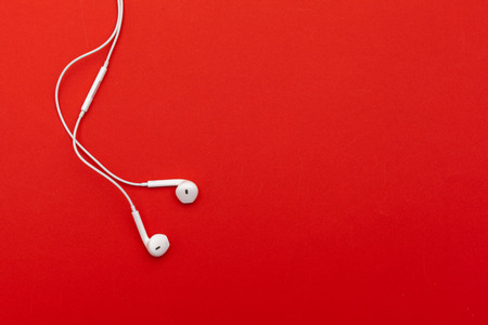 Earphons on color background.の写真素材