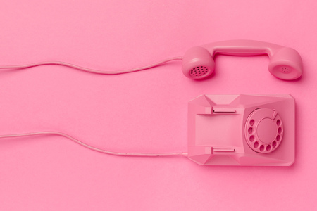vintage phone on color backgroundの写真素材