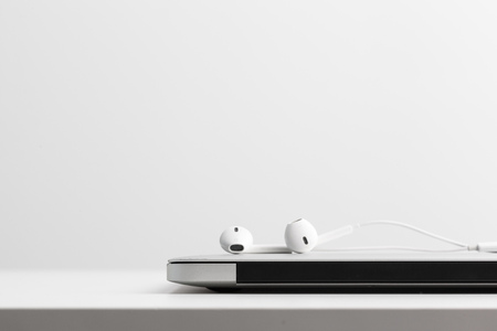 Music concept - Headphones over laptopの写真素材