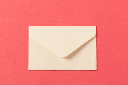 Paper envelopes on a colored pink backgroundの写真素材