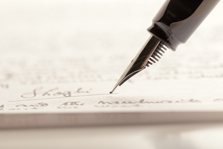 Fountain Pen on Written Pageの写真素材