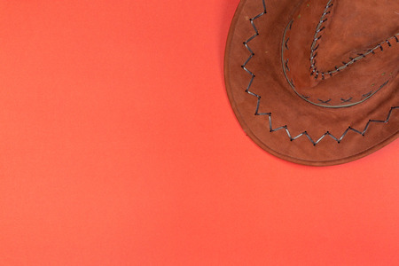 Cowboy hat on red background top viewの写真素材