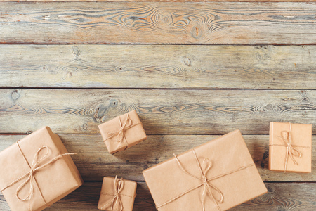 various gift boxes on wooden table, top view