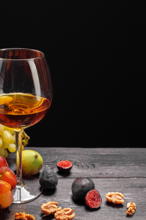 wine and grapes on the tableの写真素材