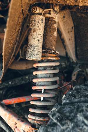 Atv Quad bike, close-up of details: headlights, shock absorberの写真素材