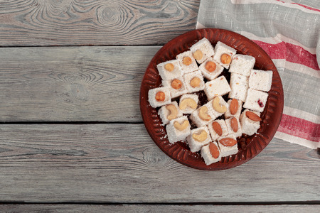 Turkish delight on a wooden table.の写真素材
