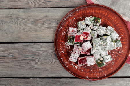 Turkish delight on a wooden table.の写真素材