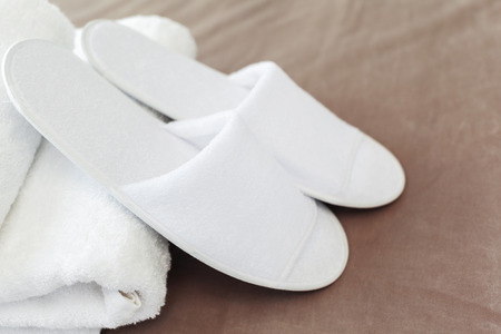 Slippers on the floor of hotel roomの写真素材