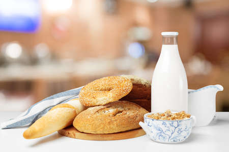 Bread and milk on the tableの写真素材