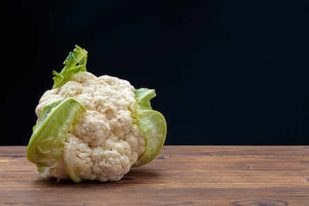 Organic cauliflower on wooden backgroundの写真素材