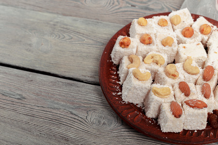 Turkish delight on a wooden table.の写真素材