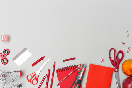 school supplies at colorful paper backgroundの写真素材