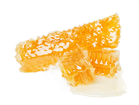 Sweet honeycomb isolated on whiteの写真素材