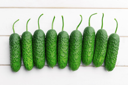 Cucumber on wooden backgroundの写真素材