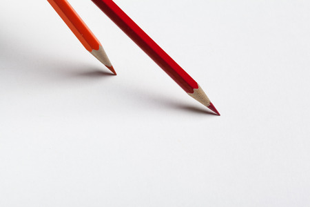Wooden colorful ordinary pencils isolated on a white backgroundの写真素材