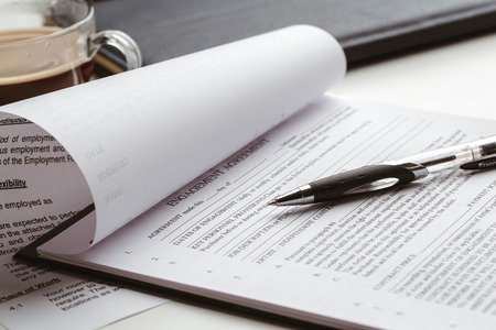 Legal contract signing - buy sell real estate contract