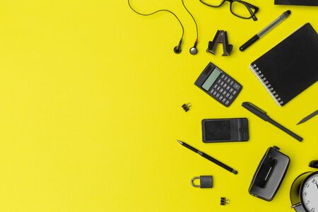 school supplies at colorful paper background